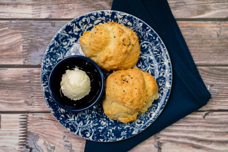 buttermilk biscuits with blueberry jam and whipped butter